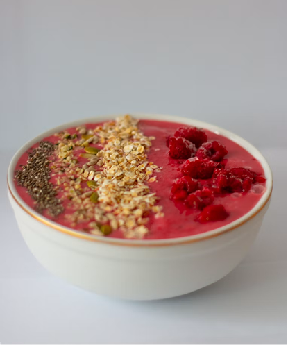 Smoothie bowl with raspberries and granola
