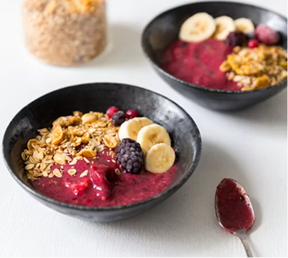 Bowl with berries and banana oatmeal
